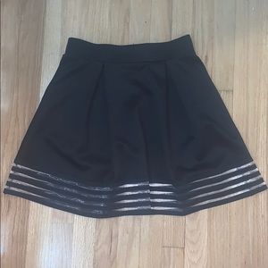 Black flare skirt with mesh striping detail